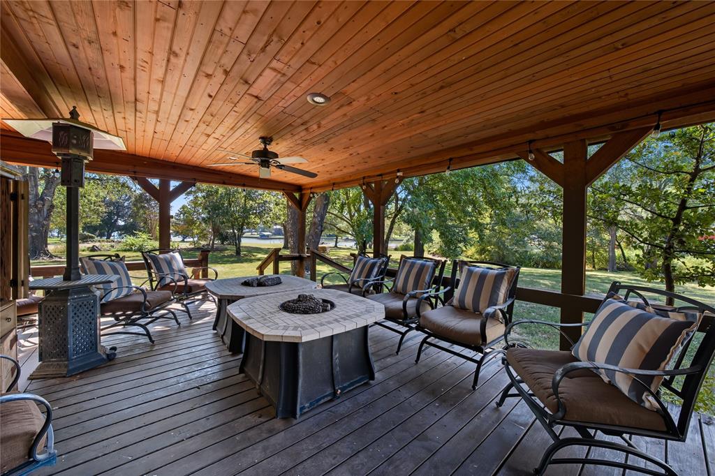 100 Letha Road Trinidad, TX 75163 - Photo 35 of 38 a view of a patio with wooden floor table and chairs