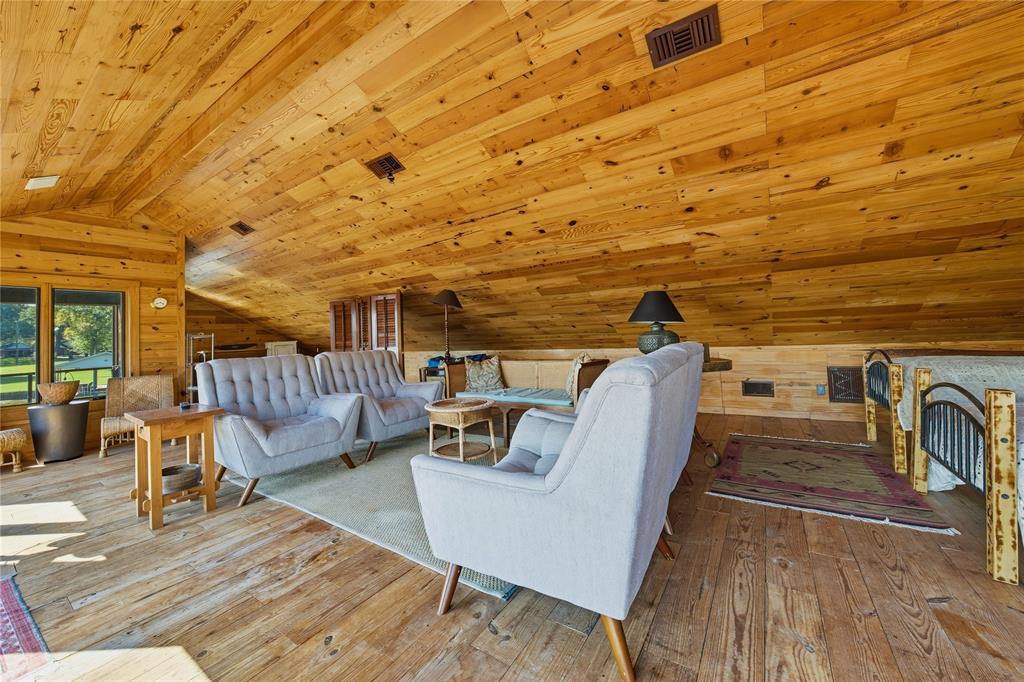 100 Letha Road Trinidad, TX 75163 - Photo 37 of 38 a view of a patio with table and chairs with wooden floor and fence