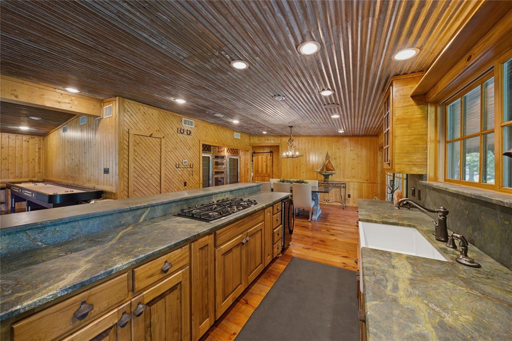 100 Letha Road Trinidad, TX 75163 - Photo 7 of 38 a large kitchen with stainless steel appliances granite countertop lots of counter top and a stove