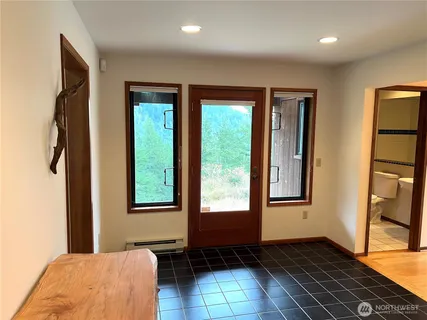 a view of room with furniture and staircase