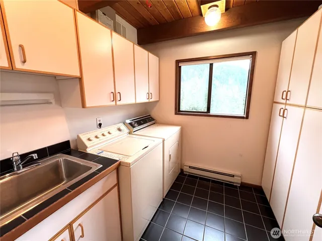 a view of a living room with a wooden floor