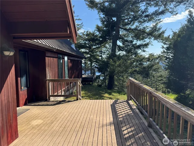 a view of balcony and wooden floor