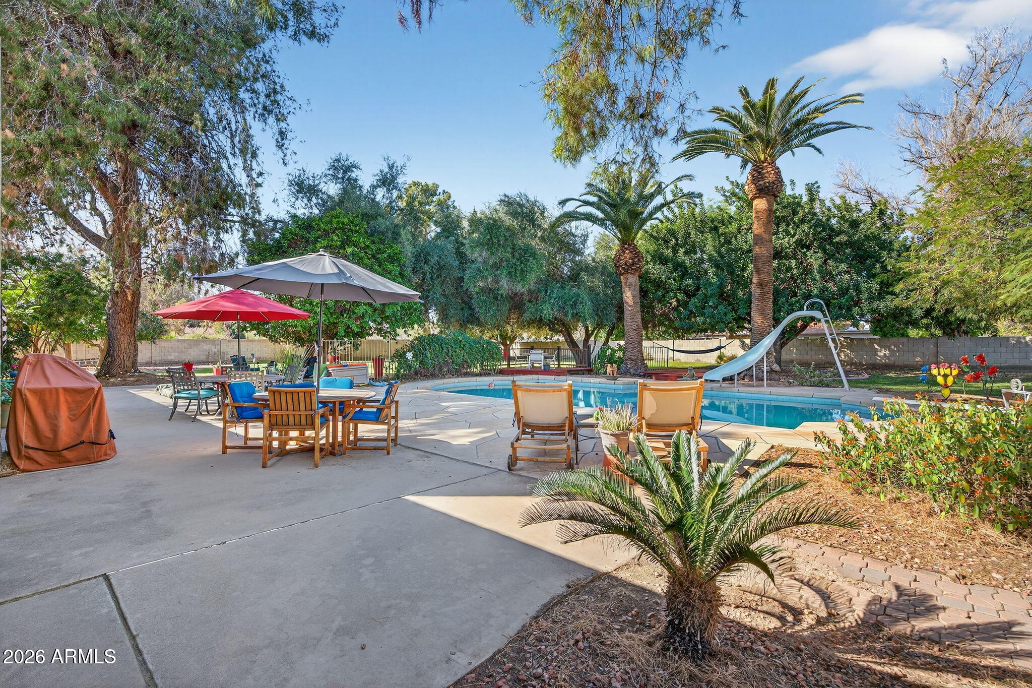 6968 West Calavar Road Peoria, AZ 85381 - Photo 38 of 65 Resort Style Backyard