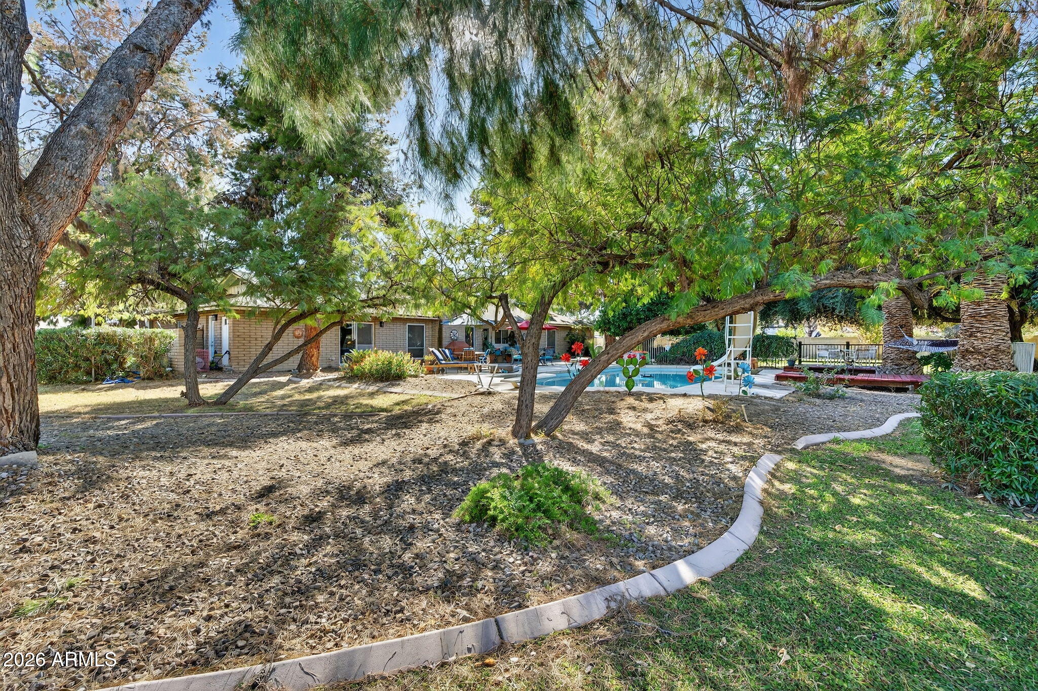 6968 West Calavar Road Peoria, AZ 85381 - Photo 51 of 65 Fully Landscaped Acre