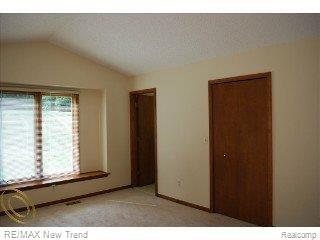 21965 River Ridge Trail, Unit 82 Farmington, MI 48335 - Photo 9 of 14 21965 RIVER RIDGE MASTER BEDROOM