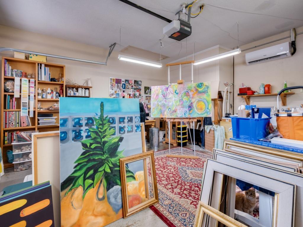 9753 Carnegie Drive Dallas, TX 75228 - Photo 24 of 25 a living room with furniture and a potted plant