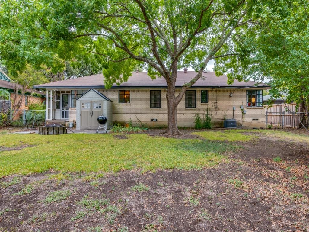 9753 Carnegie Drive Dallas, TX 75228 - Photo 25 of 25 a front view of house with yard and green space