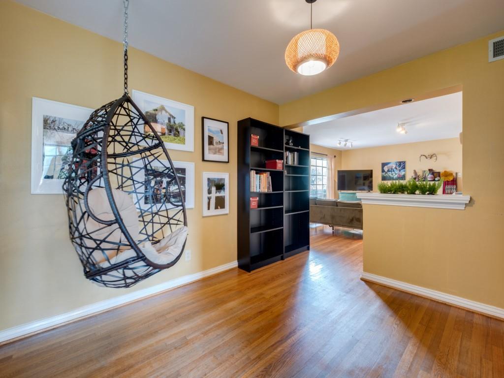 9753 Carnegie Drive Dallas, TX 75228 - Photo 8 of 25 a view of a room with shelves and wooden floor