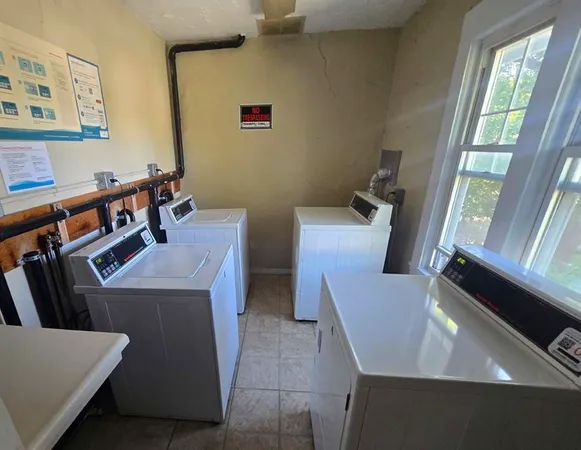 a room with furniture and a window