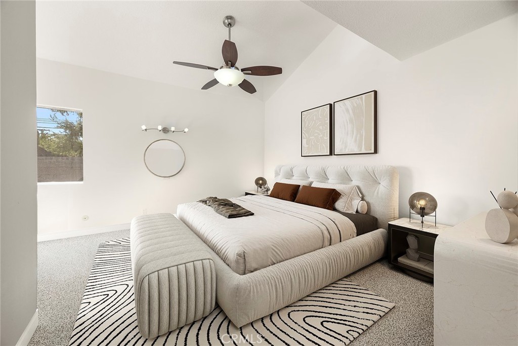 24582 Corta Cresta Drive Lake Forest, CA 92630 - Photo 12 of 26 a bedroom with a bed and wooden floor