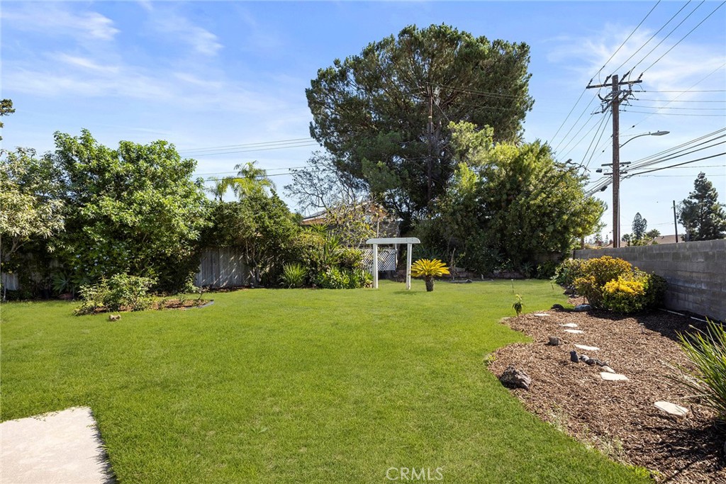 24582 Corta Cresta Drive Lake Forest, CA 92630 - Photo 24 of 26 a backyard of a house with lots of green space