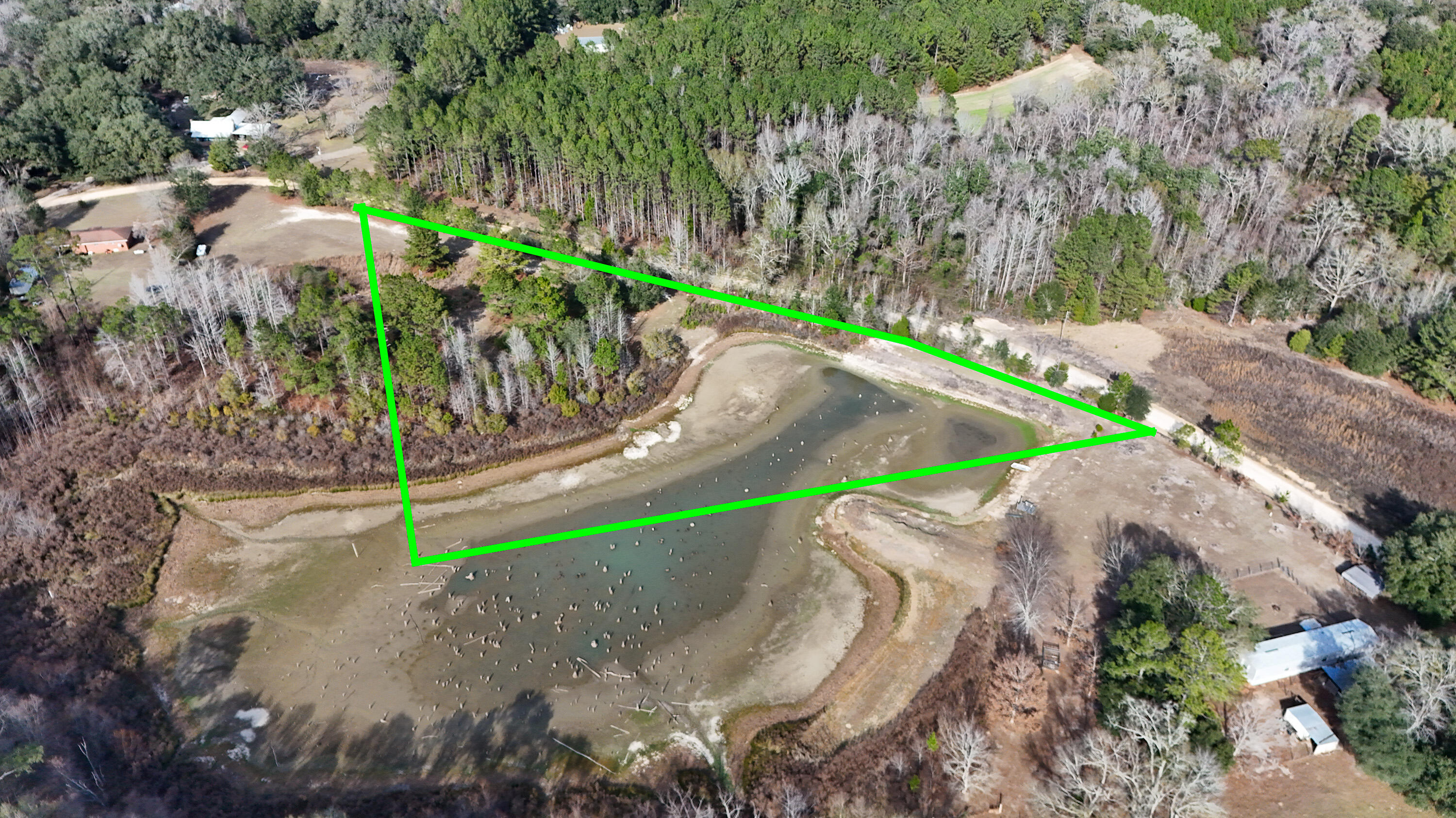 3.40-ac Bulger Town Road Florala, AL 36442 - Photo 3 of 14 an aerial view of a house