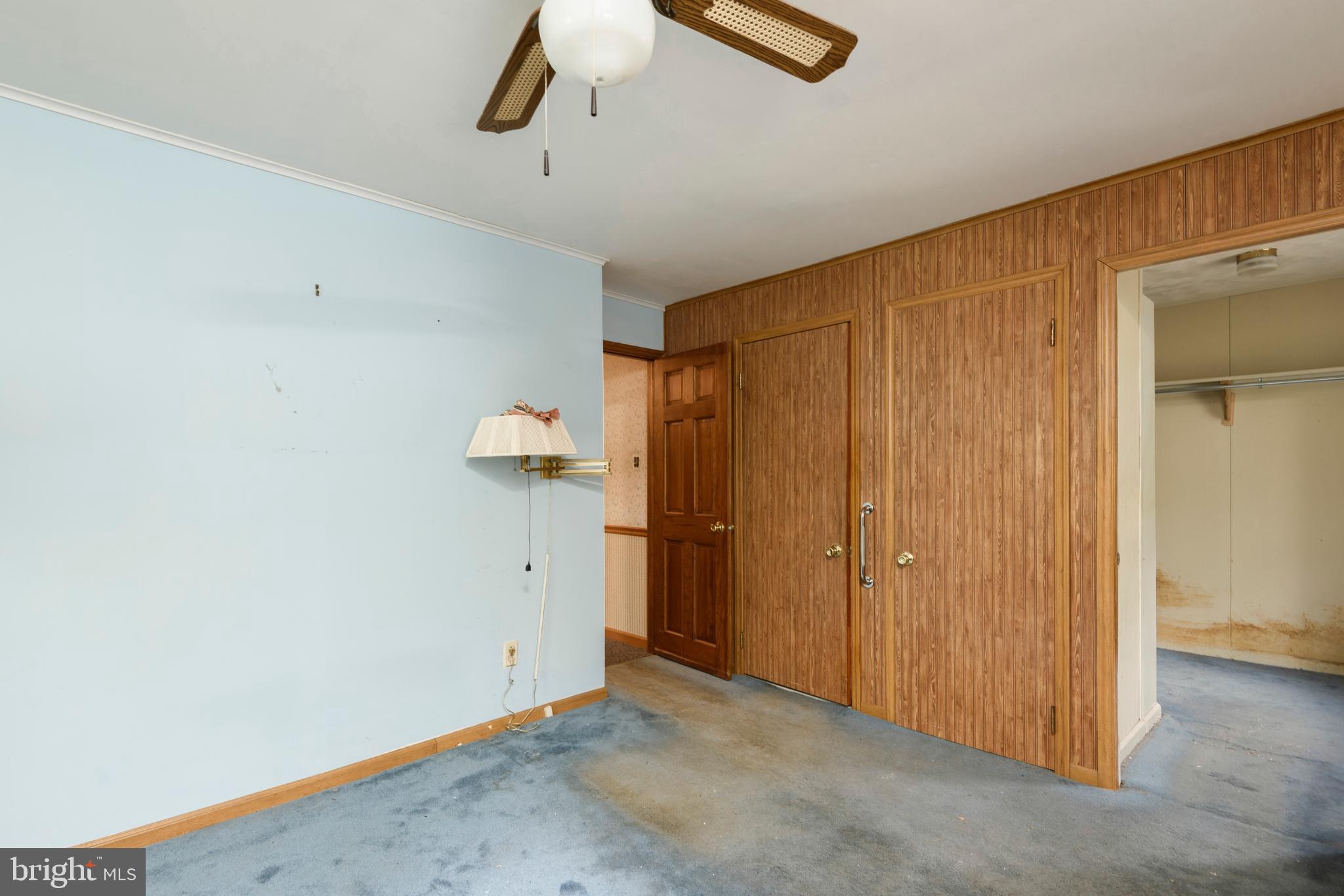 3463 Garnet Mine Road Garnet Valley, PA 19060 - Photo 15 of 38 an empty room with closet and chandelier fan