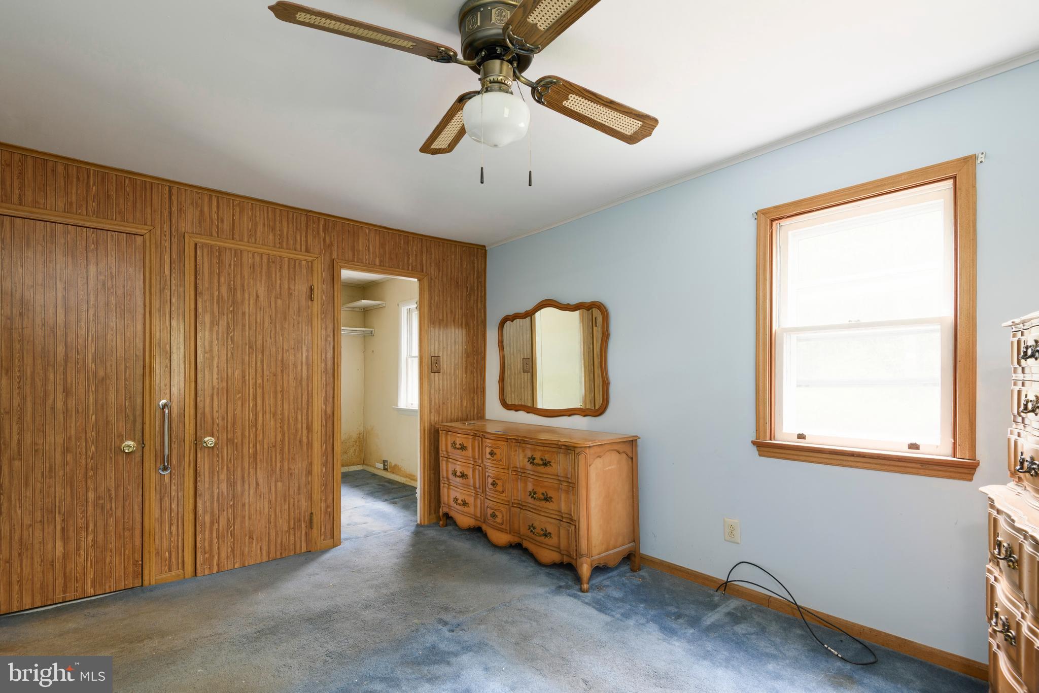 3463 Garnet Mine Road Garnet Valley, PA 19060 - Photo 16 of 38 a view of a livingroom with a window and a ceiling fan