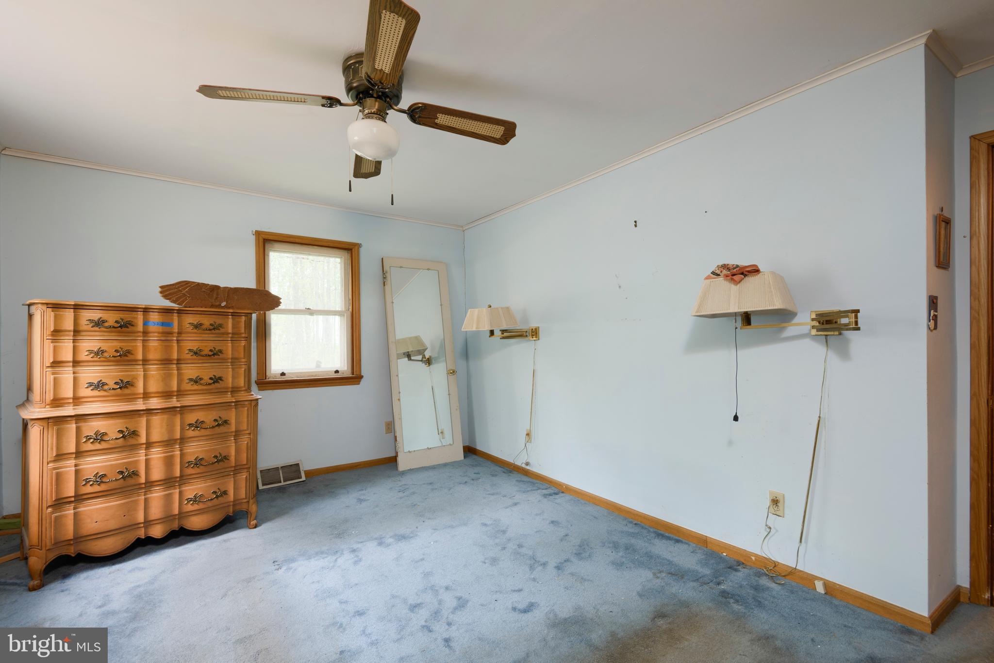 3463 Garnet Mine Road Garnet Valley, PA 19060 - Photo 17 of 38 a view of room with cabinet and ceiling fan