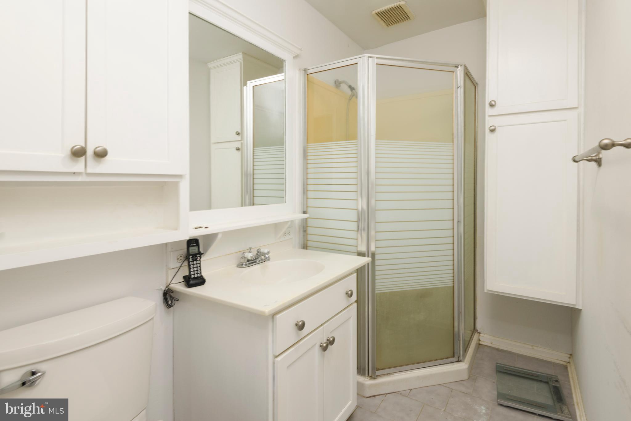 3463 Garnet Mine Road Garnet Valley, PA 19060 - Photo 18 of 38 a bathroom with a sink and a mirror
