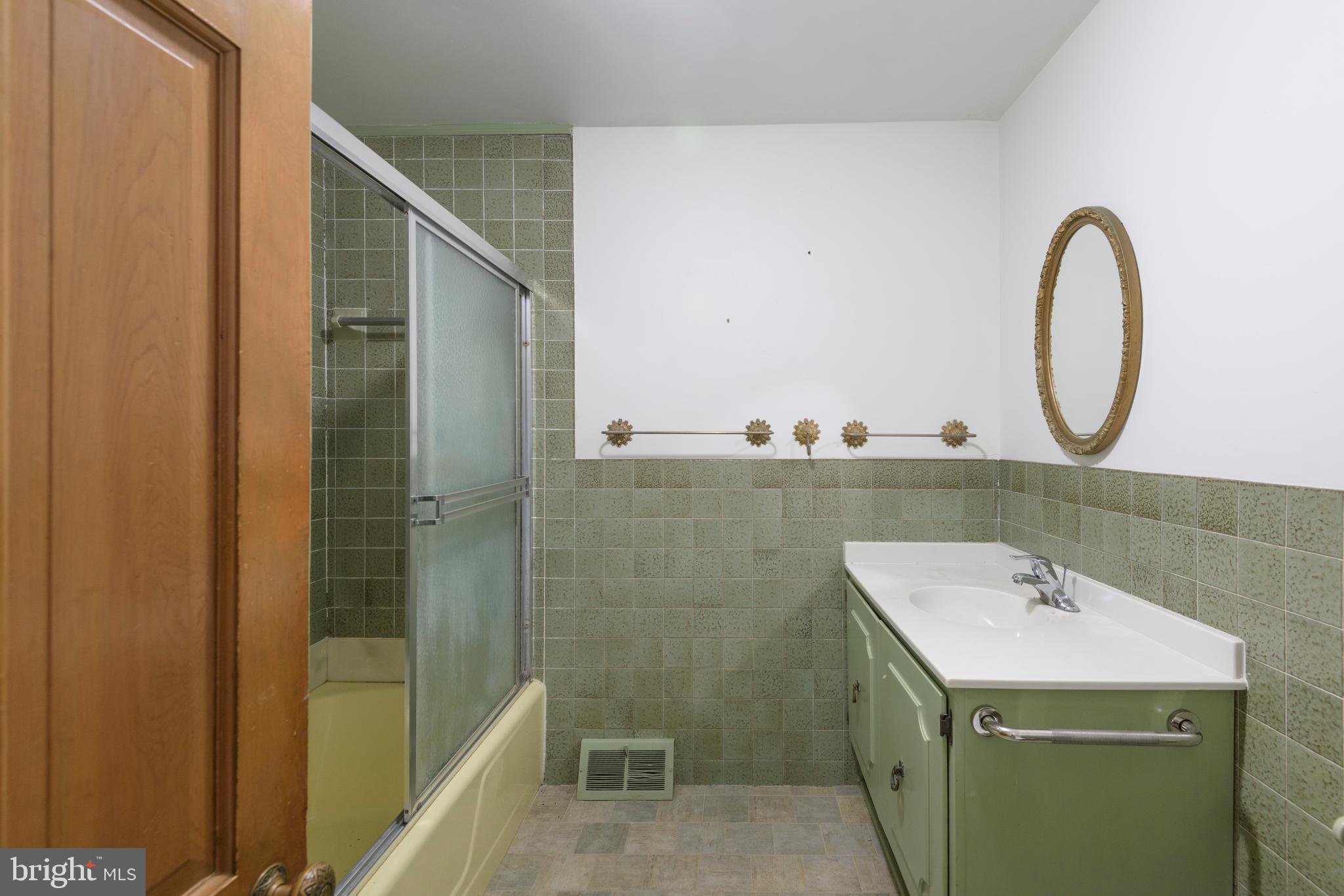 3463 Garnet Mine Road Garnet Valley, PA 19060 - Photo 23 of 38 a bathroom with a sink a toilet and shower