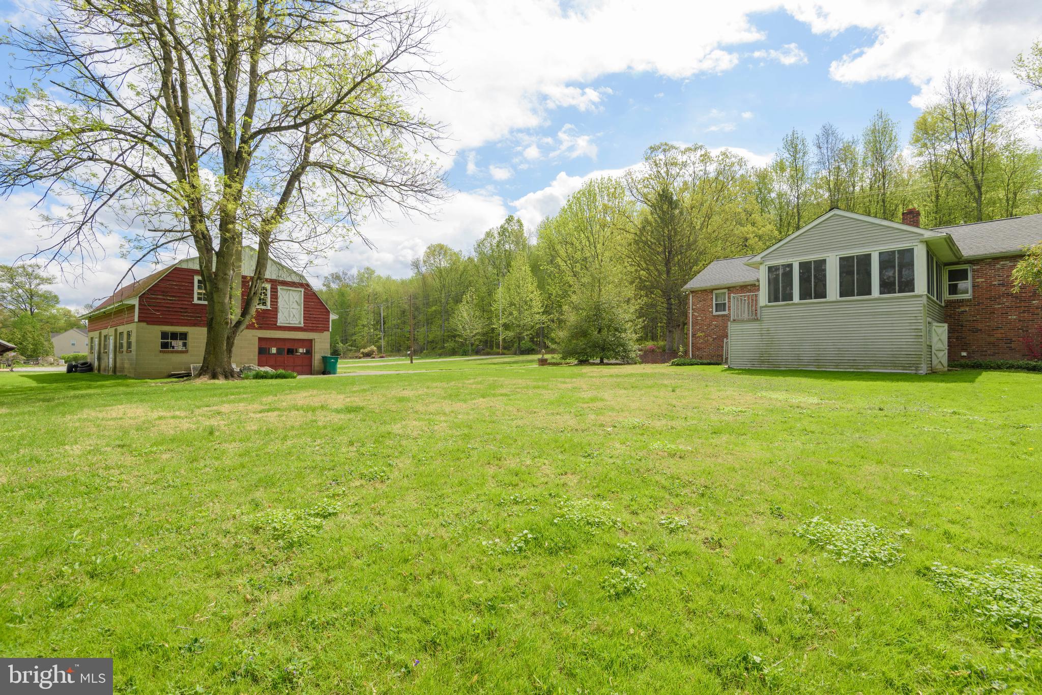 3463 Garnet Mine Road Garnet Valley, PA 19060 - Photo 25 of 38 a front view of a house with a yard