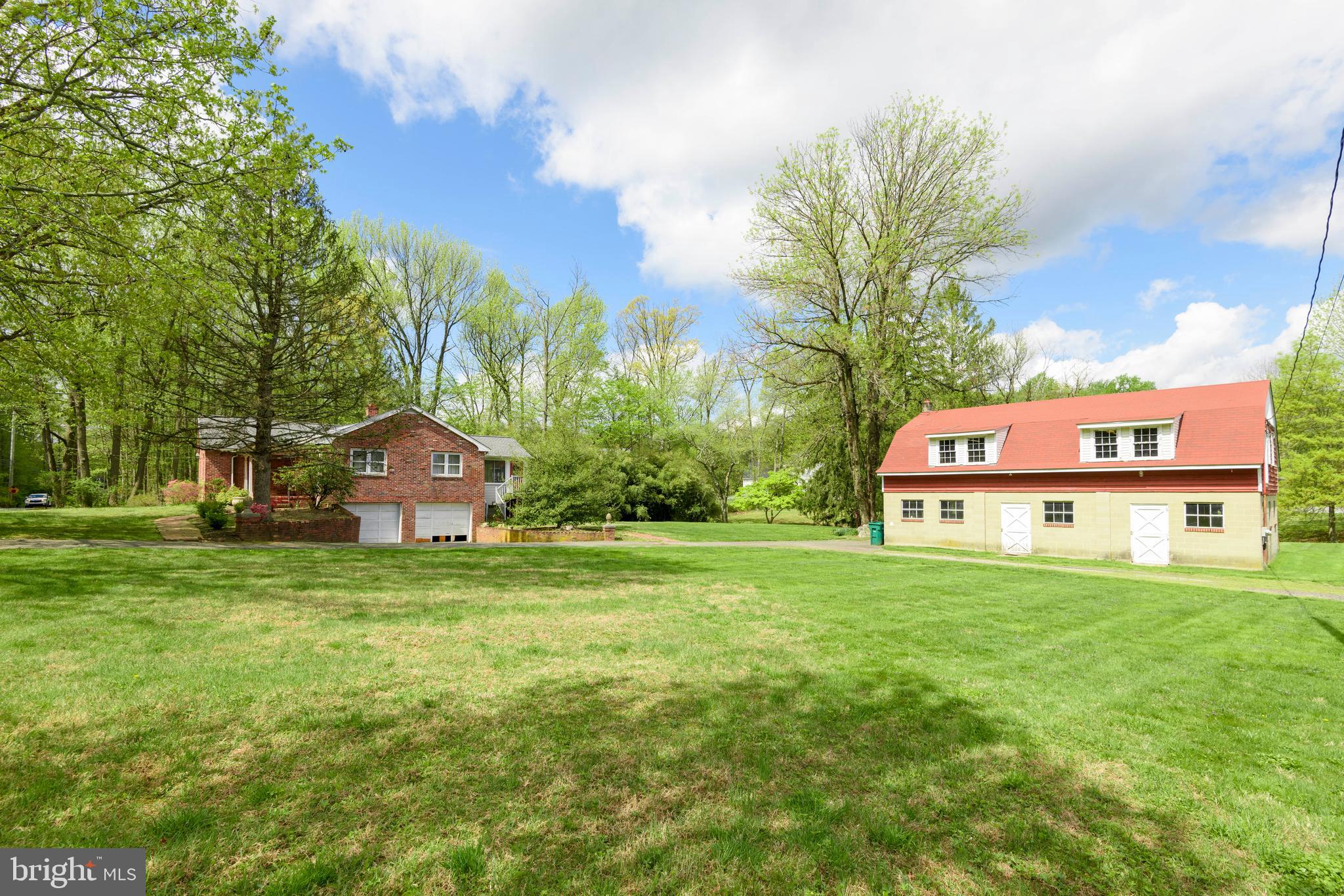 3463 Garnet Mine Road Garnet Valley, PA 19060 - Photo 27 of 38 a house view with a garden space