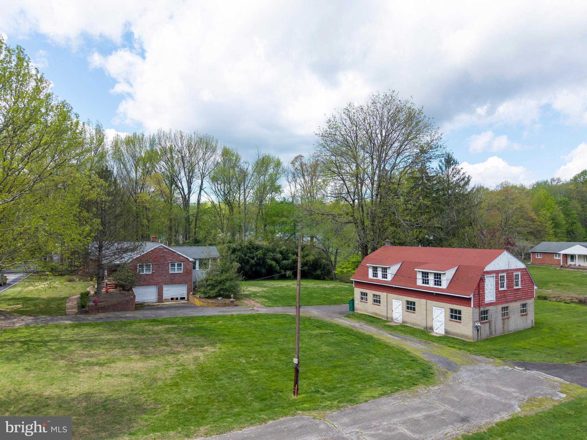 3463 Garnet Mine Road Garnet Valley, PA 19060 - Photo 28 of 38 a view of a house with a yard