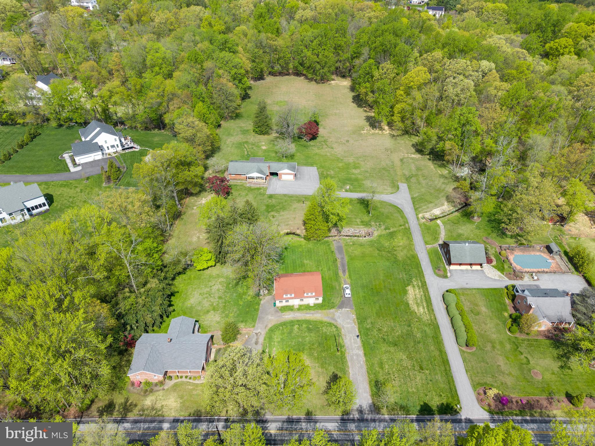 3463 Garnet Mine Road Garnet Valley, PA 19060 - Photo 32 of 38 an aerial view of residential house with outdoor space and trees