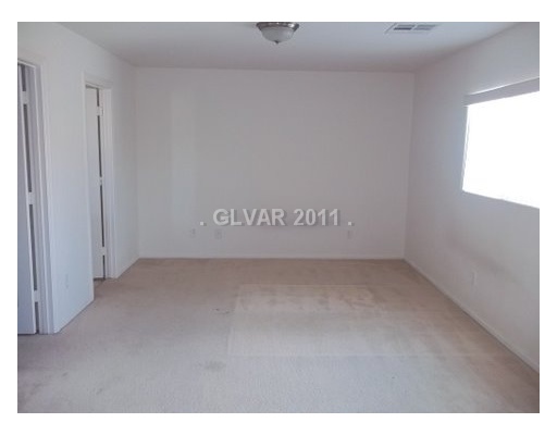 8277 Time Machine Avenue Las Vegas, NV 89113 - Photo 6 of 9 Master Bedroom.