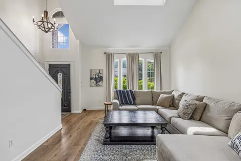 a living room with furniture and a couch