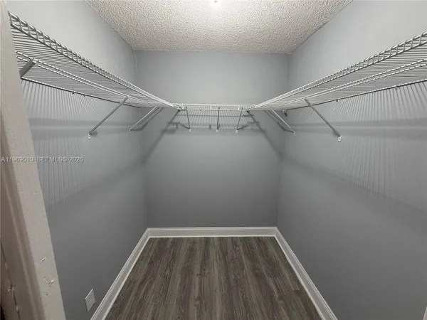 a view of a room with racks on the wall