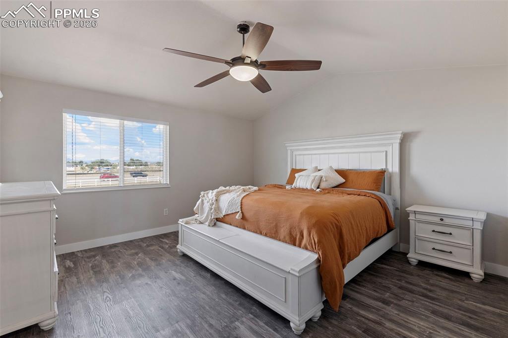 7636 Bullet Road Peyton, CO 80831 - Photo 18 of 30 a bedroom with a bed and window