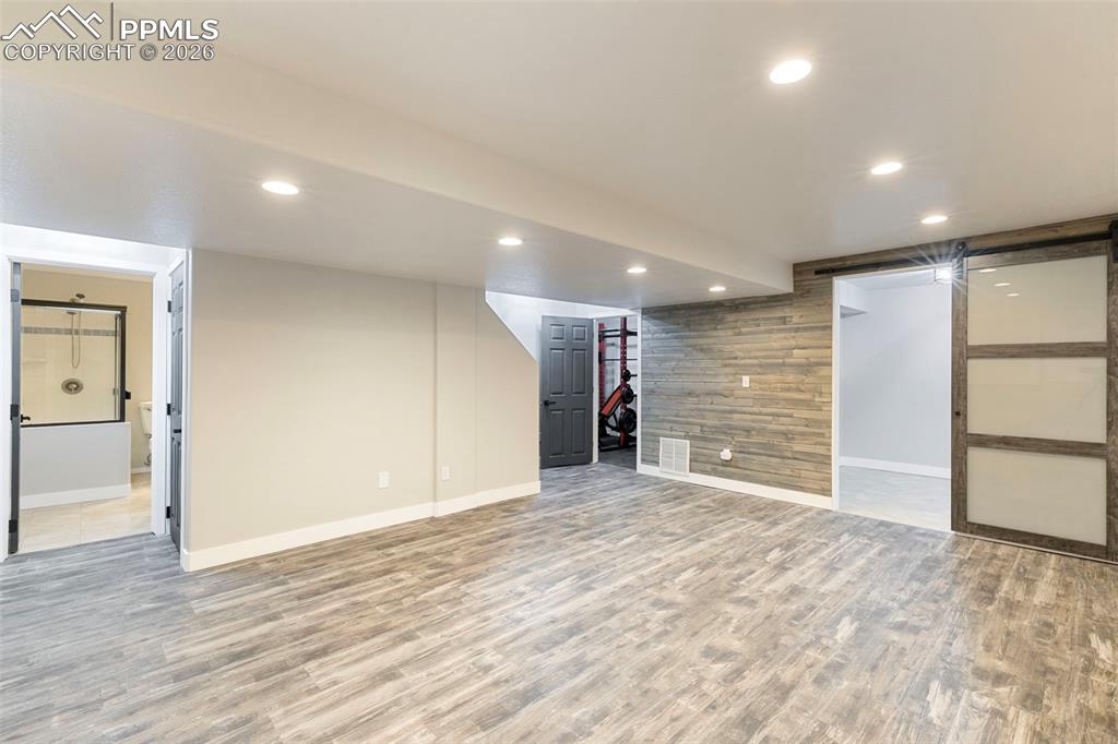 7636 Bullet Road Peyton, CO 80831 - Photo 21 of 30 a view of empty room with wooden floor