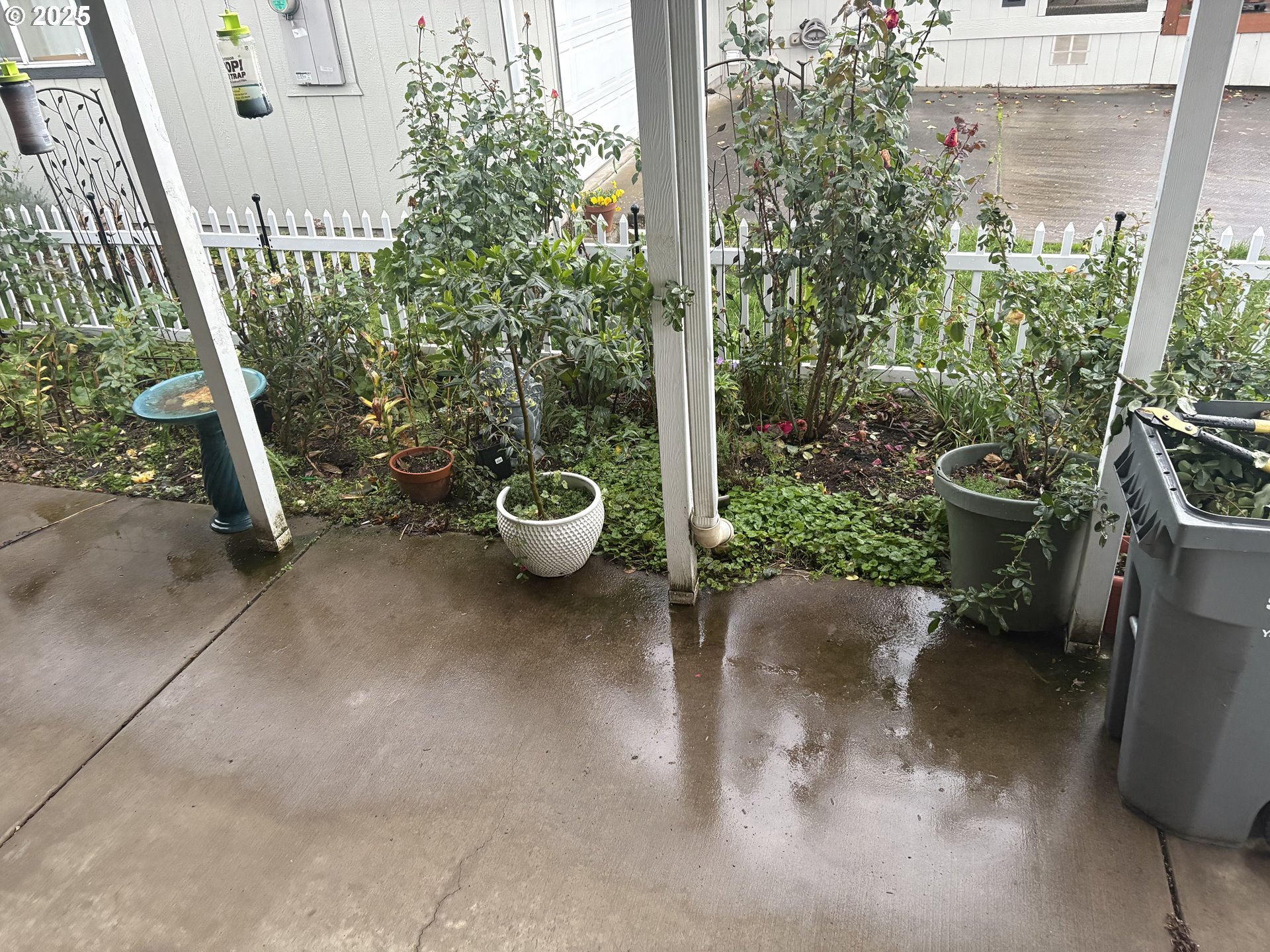 1699 North Terry Street, Unit 272 Eugene, OR 97402 - Photo 25 of 25 a view of a backyard of the house with a patio