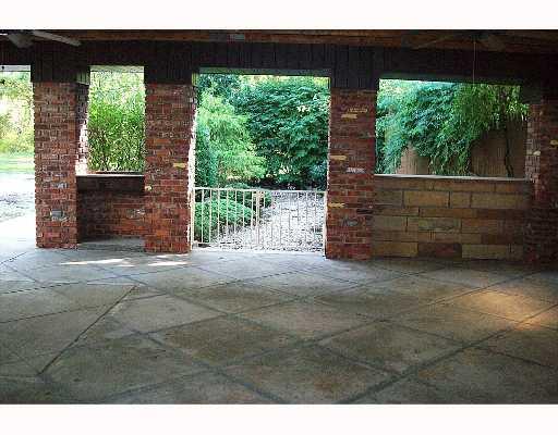 7815 Noblestown Road McDonald, PA 15057 - Photo 10 of 15 Exterior Back. PATIO VIEW TO GARDEN