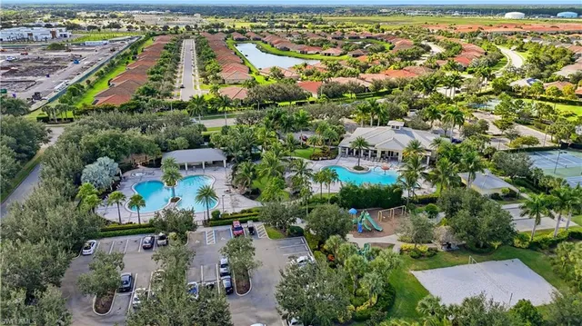 an aerial view of a house with a lake view