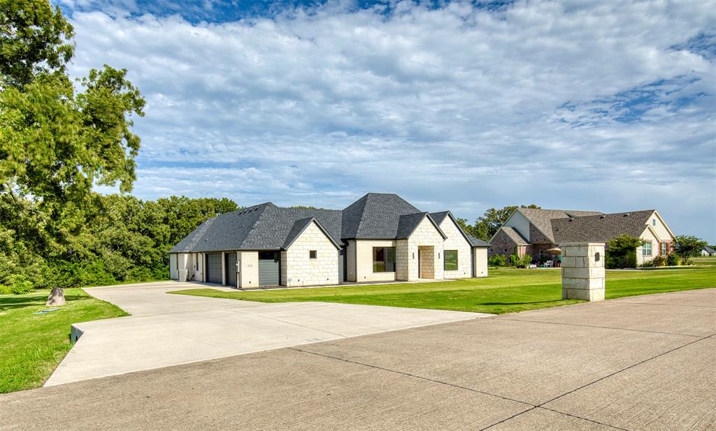 1044 Hidden Oaks Drive Wills Point, TX 75169 - Photo 2 of 29 a view of house with garden
