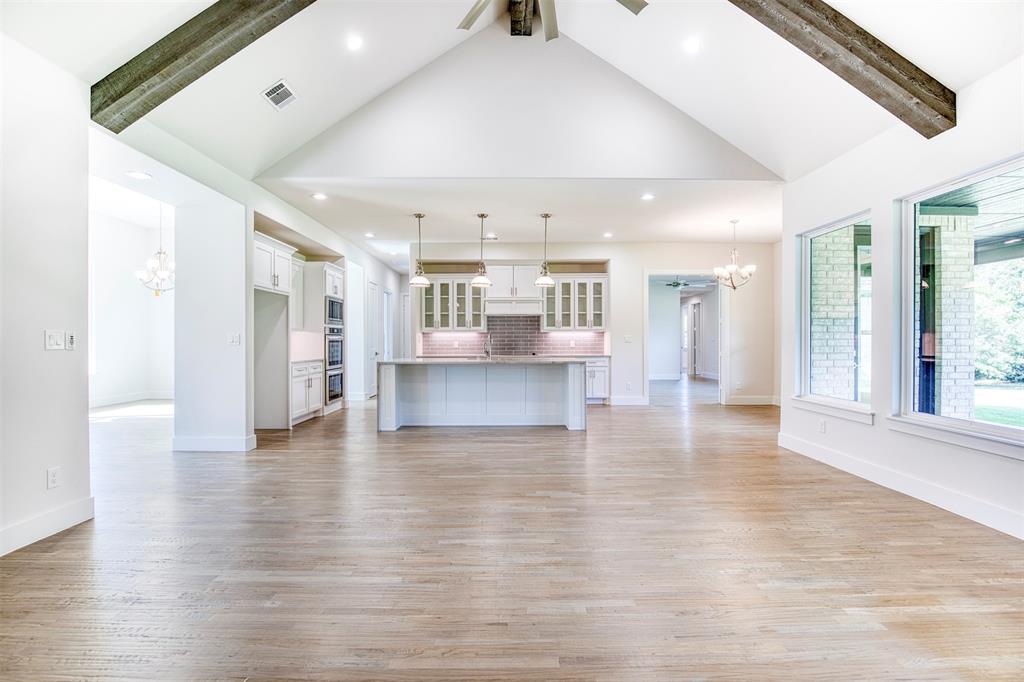 1044 Hidden Oaks Drive Wills Point, TX 75169 - Photo 3 of 29 a view of kitchen with furniture and wooden floor