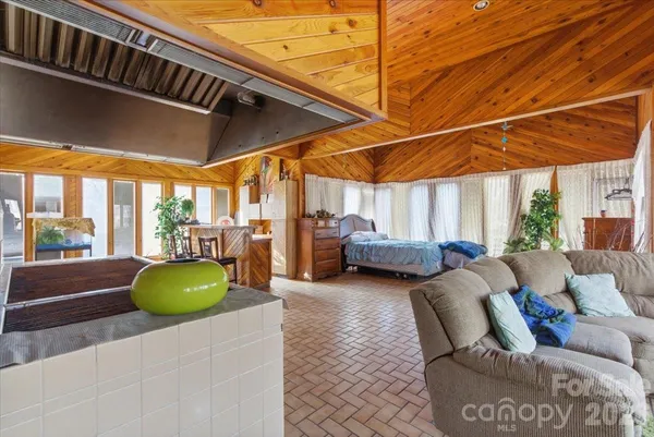 a living room filled with furniture and furniture