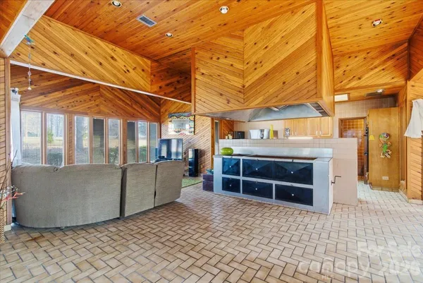 a view of a couch and table in the patio