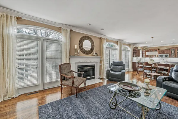 a view of a house with backyard and porch