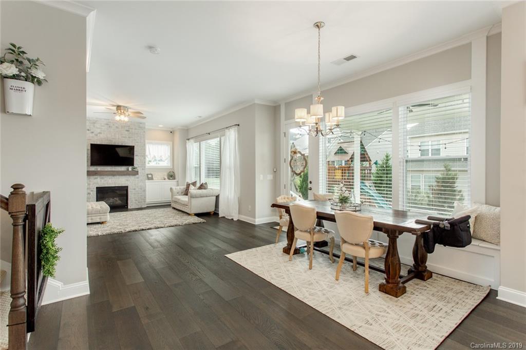 5231 Meadowcroft Way Fort Mill, SC 29708 - Photo 13 of 40 a living room with furniture and a chandelier