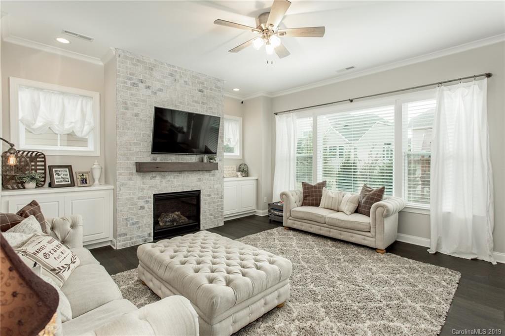 5231 Meadowcroft Way Fort Mill, SC 29708 - Photo 14 of 40 a living room with furniture fireplace and flat screen tv