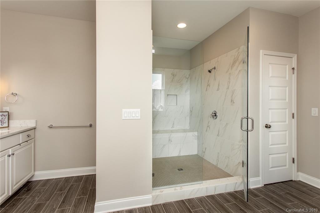 5231 Meadowcroft Way Fort Mill, SC 29708 - Photo 21 of 40 a bathroom with a shower and a sink