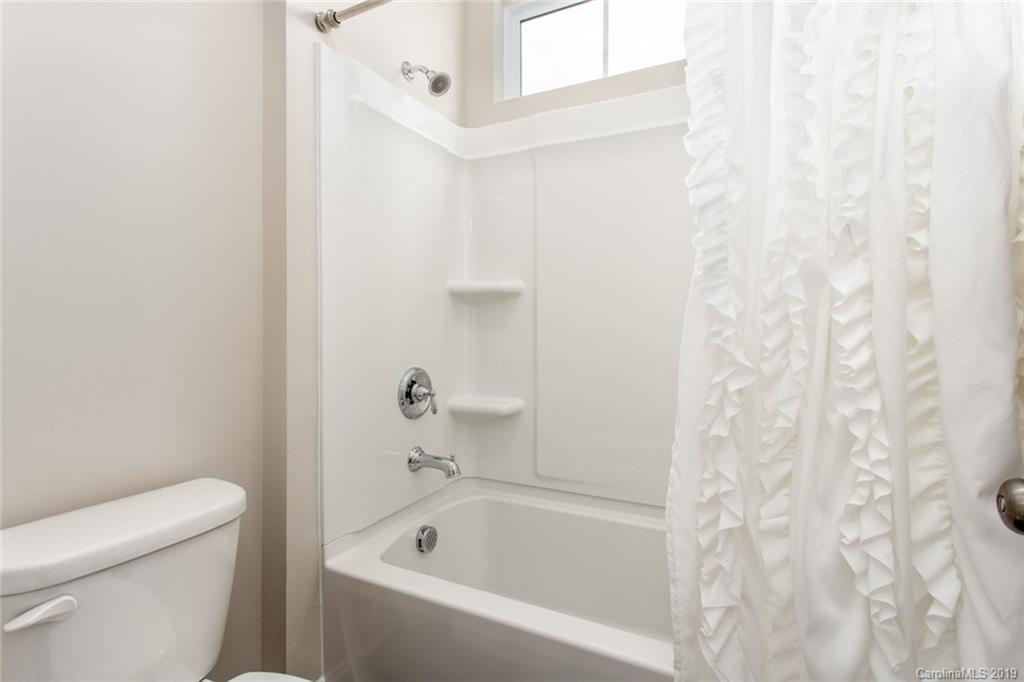 5231 Meadowcroft Way Fort Mill, SC 29708 - Photo 25 of 40 a white bath tub sitting next to a white toilet