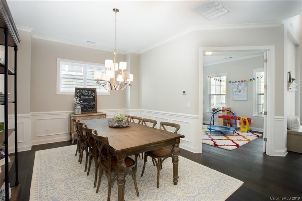 5231 Meadowcroft Way Fort Mill, SC 29708 - Photo 6 of 40 a view of a dining room with furniture and chandelier