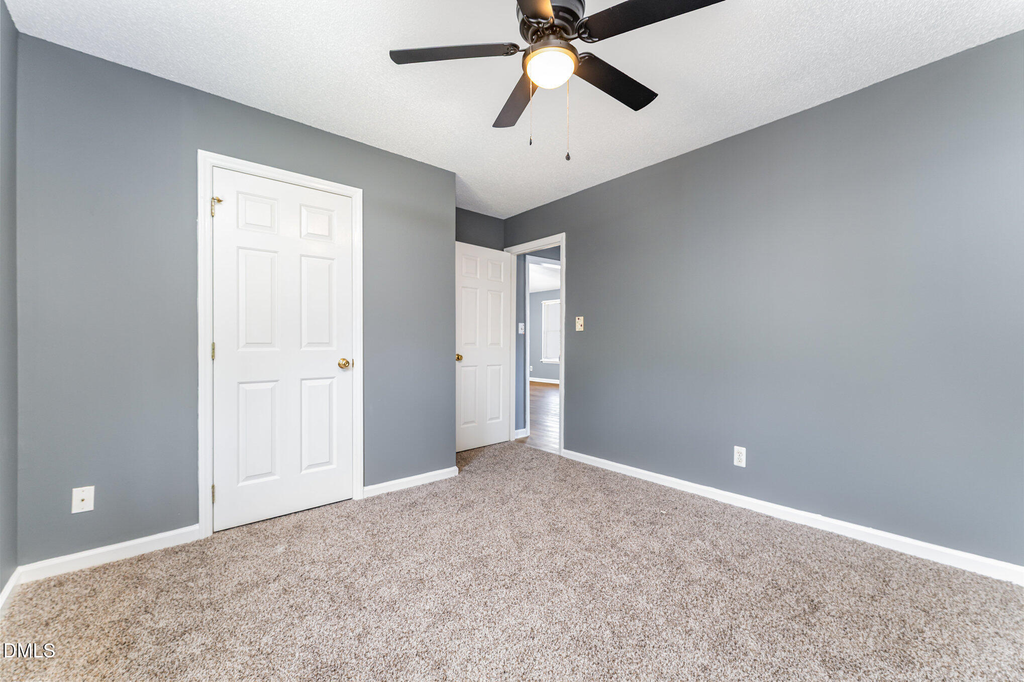 6408 Glen Brack Court Raleigh, NC 27603 - Photo 14 of 23 a view of an empty room and window