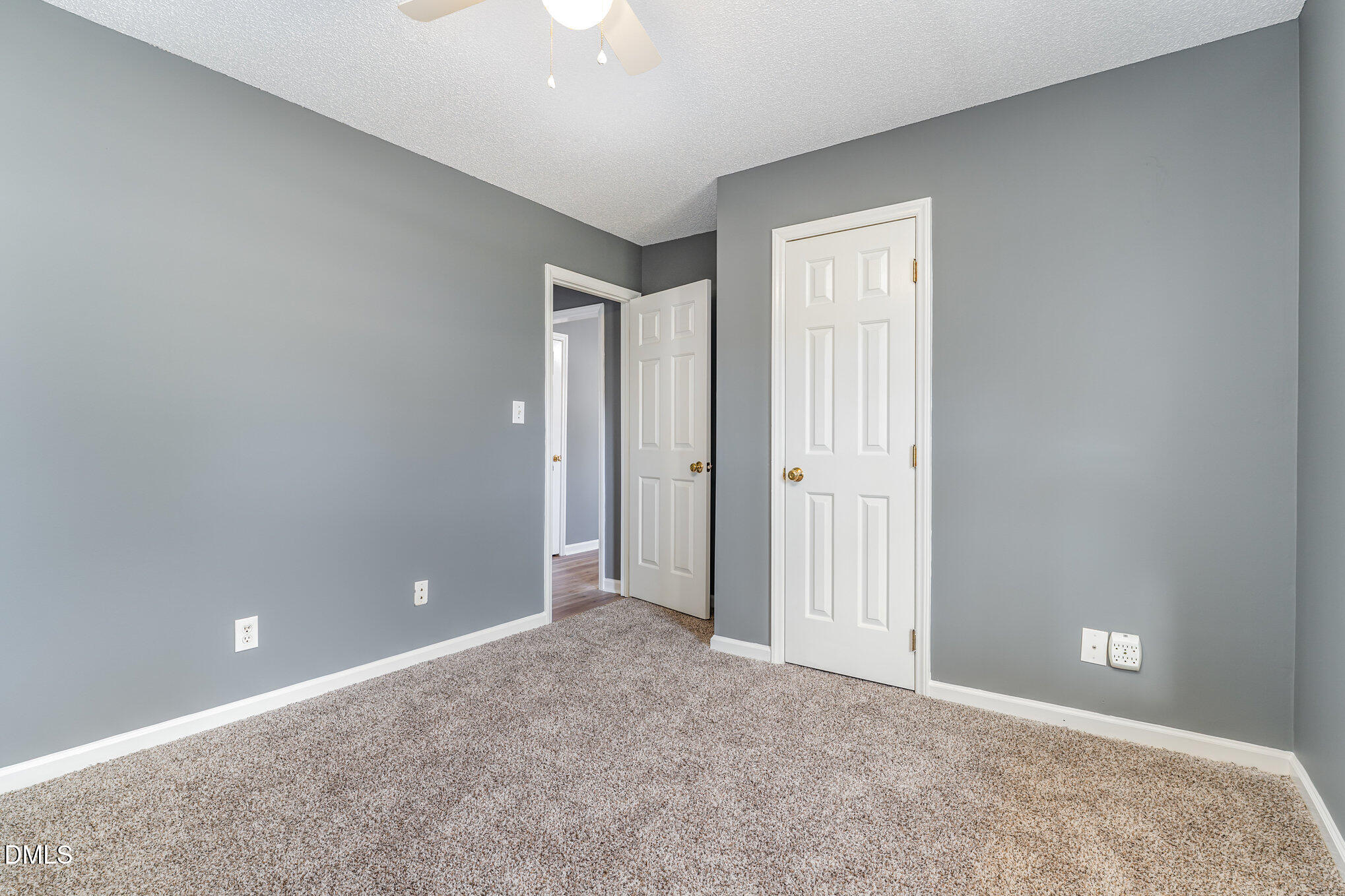 6408 Glen Brack Court Raleigh, NC 27603 - Photo 15 of 23 an empty room with closet and windows