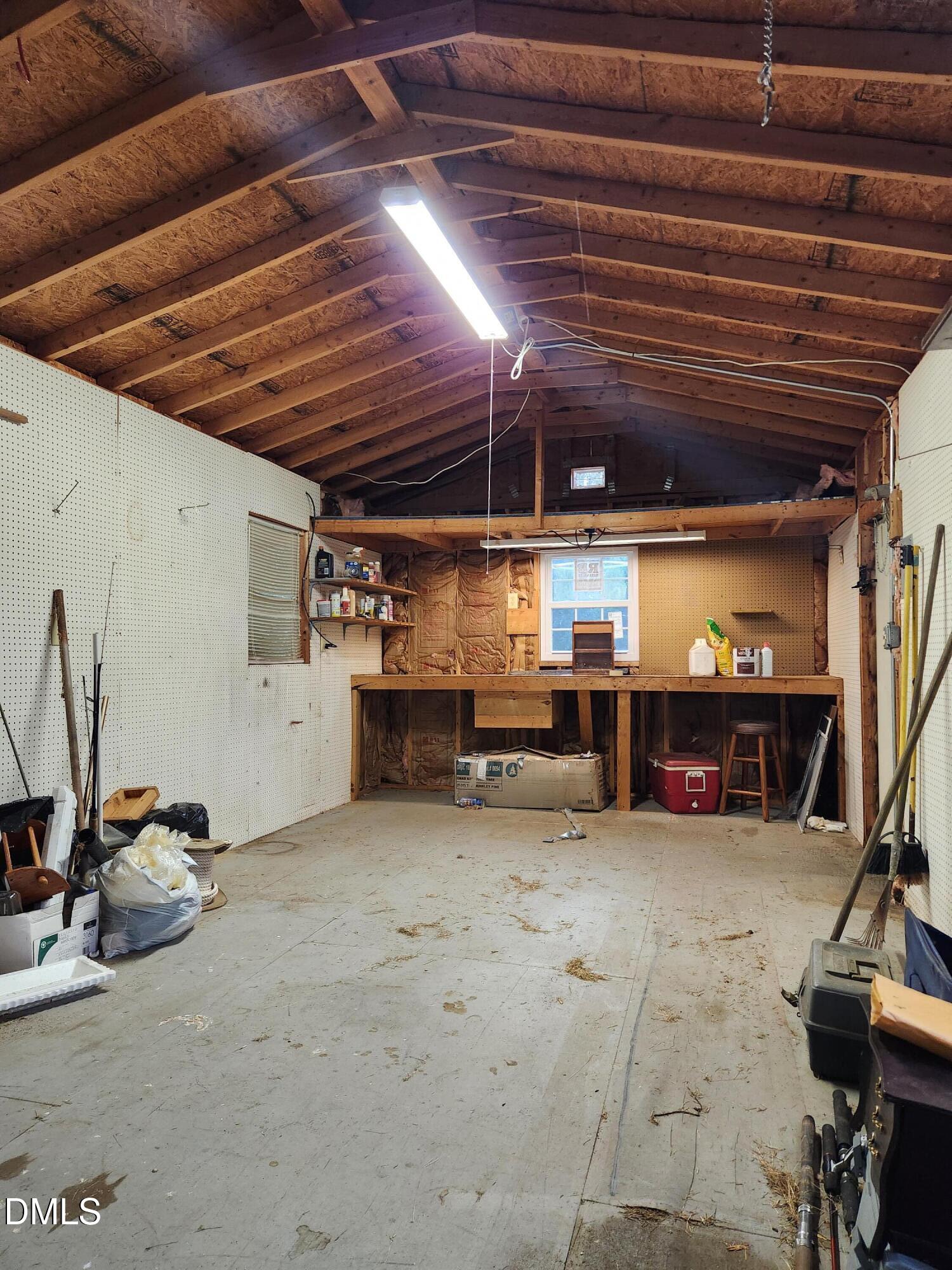 6408 Glen Brack Court Raleigh, NC 27603 - Photo 19 of 23 a view of a garage with storage