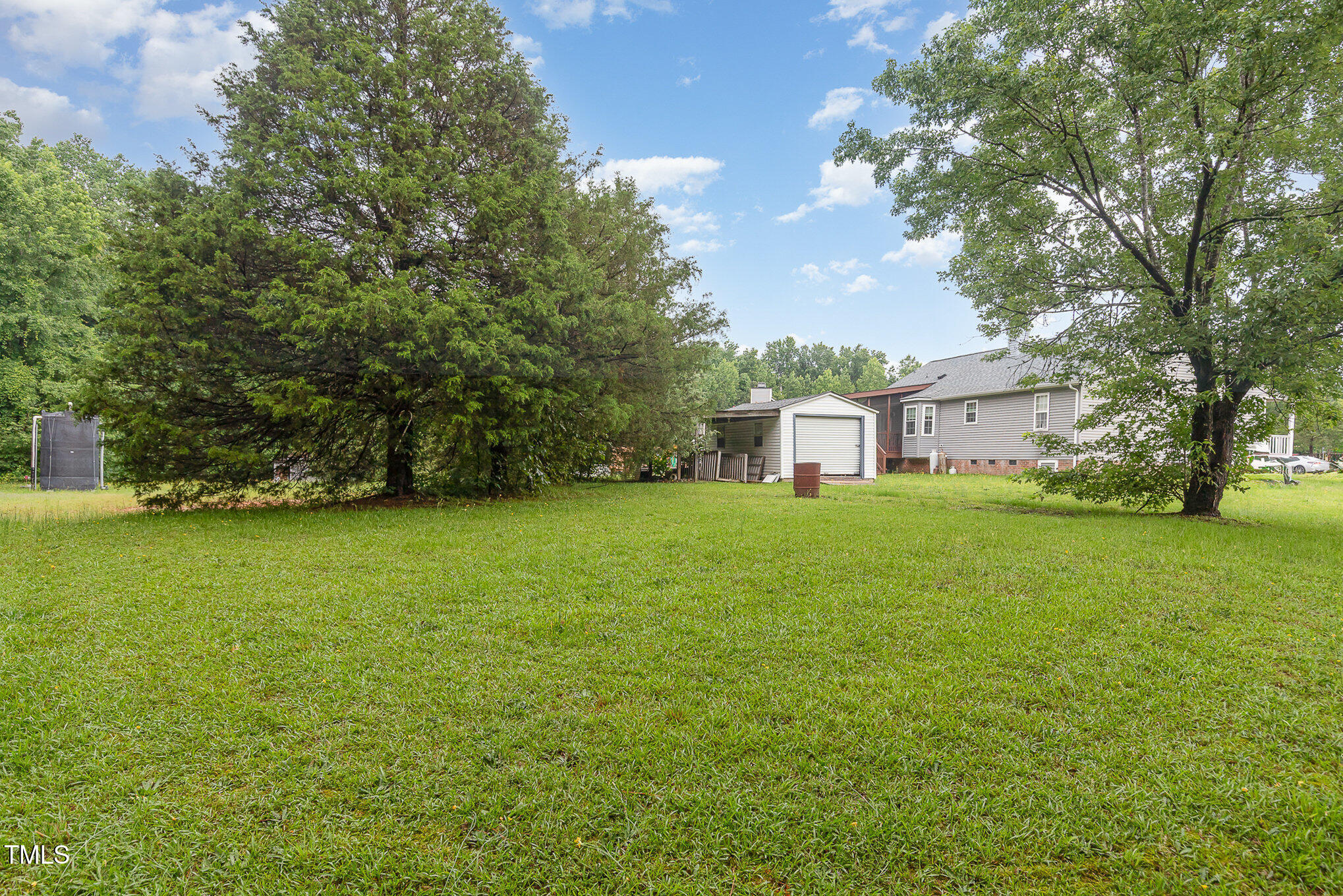 6408 Glen Brack Court Raleigh, NC 27603 - Photo 20 of 23 a house view with a garden space
