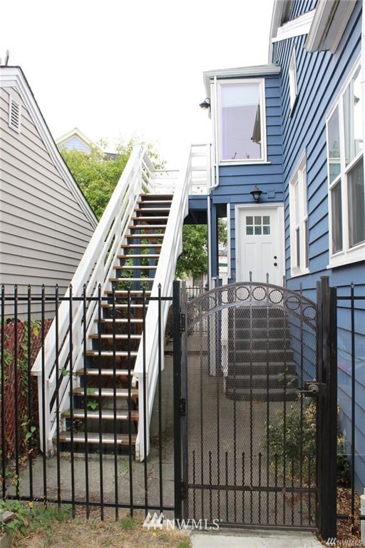 2515 16th Avenue South Seattle, WA 98144 - Photo 10 of 18 a view of a yard with wooden fence