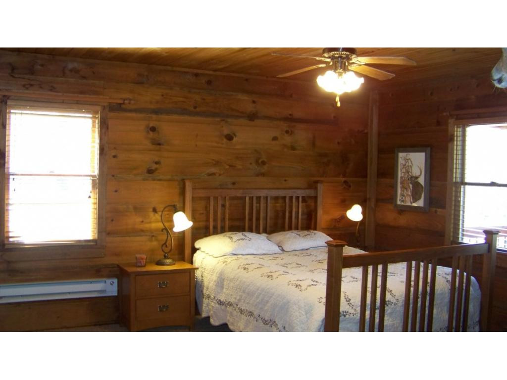 6070 Sink Valley Road Butler, TN 37640 - Photo 12 of 34 MASTER BEDROOM ON MAIN