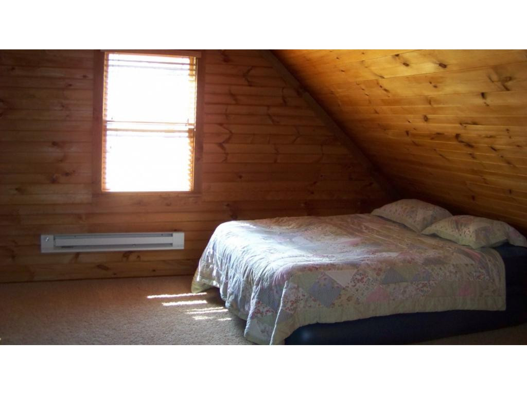 6070 Sink Valley Road Butler, TN 37640 - Photo 16 of 34 VAULTED CEILING IN BEDROOM